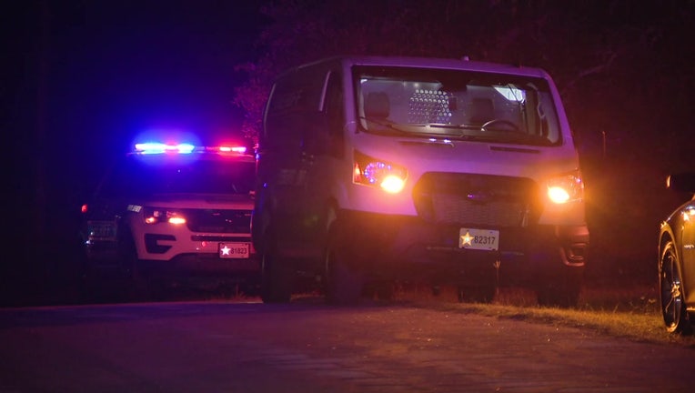 Law enforcement vehicles at the scene of a death investigation in Weeki Wachee.