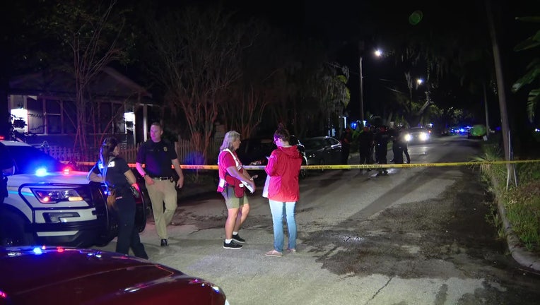 Crime scene tape outside of a fatal Tampa house fire in which one person was killed and one was detained.