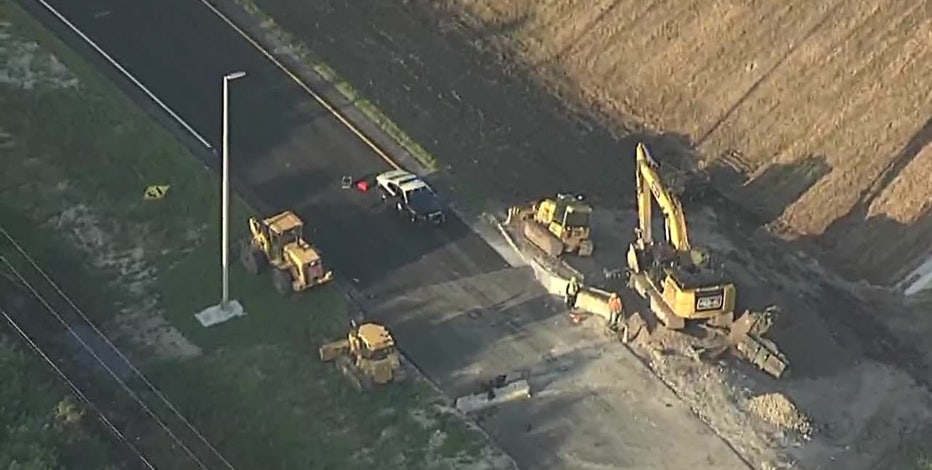 Motorcyclist dies in crash after driving through road closure