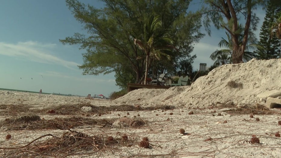 Crews are working to restore dunes at Sunset Beach.