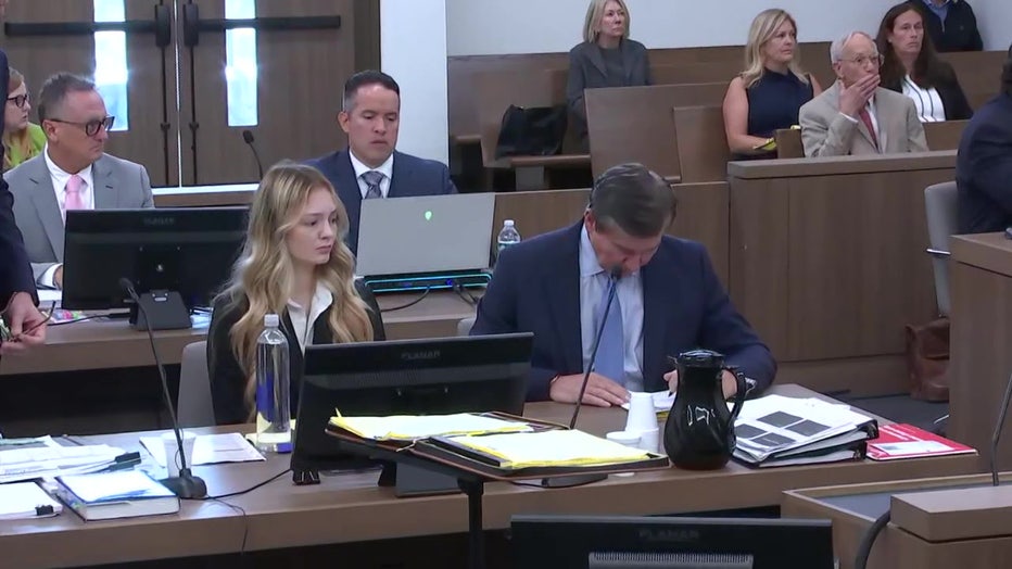 Maya Kowalski sits in a courtroom as a $200 million case against All Children's Hospital gets underway in Sarasota County.