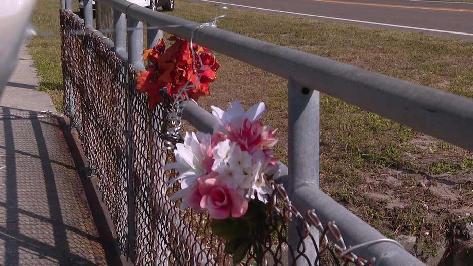 A makeshift memorial sits where an alligator was found with human remains. 