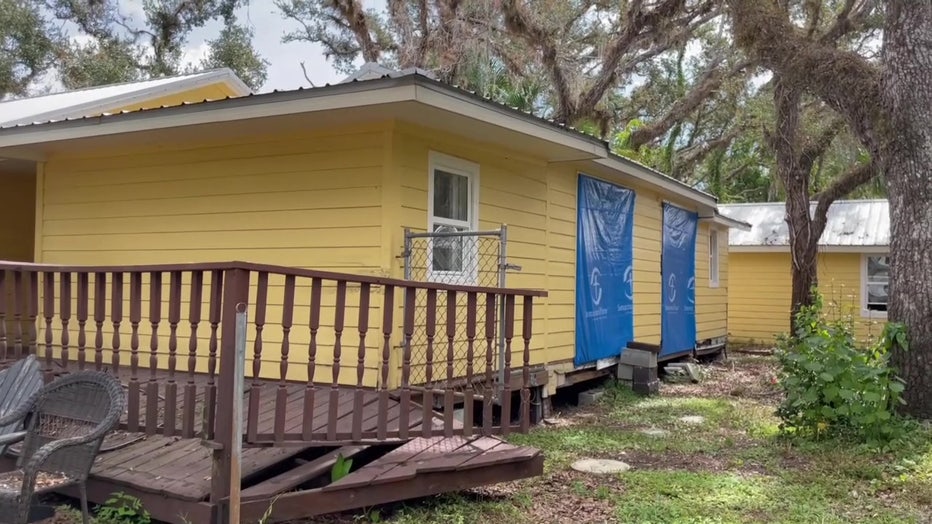 Exterior of Hurricane Ian damaged home. 