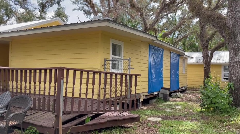 Exterior of Hurricane Ian damaged home.
