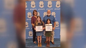 Young sisters honored by Tampa Police Department with citizen awards for work in community