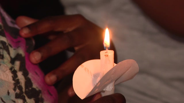 Candlelight vigil honors death of East Tampa hit-and-run victim, family pleas for arrest
