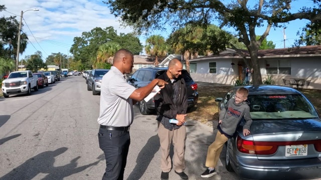 Former Bucs player Warrick Dunn helps make new home possible for Clearwater father, son