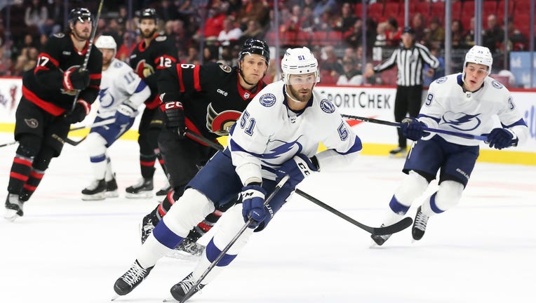 OTTAWA, CANADA - OCTOBER 15: Austin Watson #51 of the Tampa Bay Lightning skates with the puck against the Ottawa Senators in the third period at Canadian Tire Centre on October 15, 2023 in Ottawa, Ontario, Canada. (Photo by Chris Tanouye/Freestyle Photography/Getty Images)