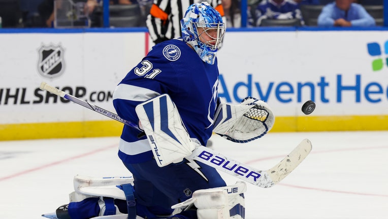 Johansson wins in debut, Paul has 2 power-play goals and Lightning