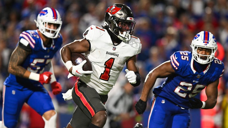 ORCHARD PARK, NY - OCTOBER 26: Rachaad White #1 of the Tampa Bay Buccaneers runs with the football during the second half against the Buffalo Bills at Highmark Stadium on October 26, 2023 in Orchard Park, New York. (Photo by Kathryn Riley/Getty Images)