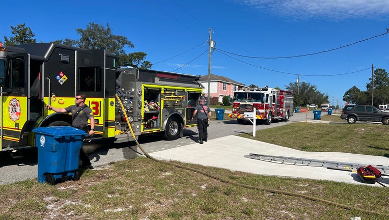 Fire trucks outside Spring Hill home that caught fire on Tuesday injuring two women. Image is courtesy of Hernando County Fire Rescue.