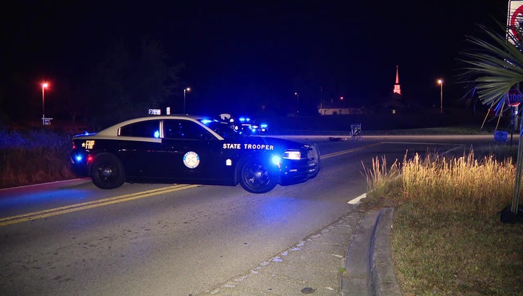 A FHP patrol car at scene of fatal hit-and-run crash.