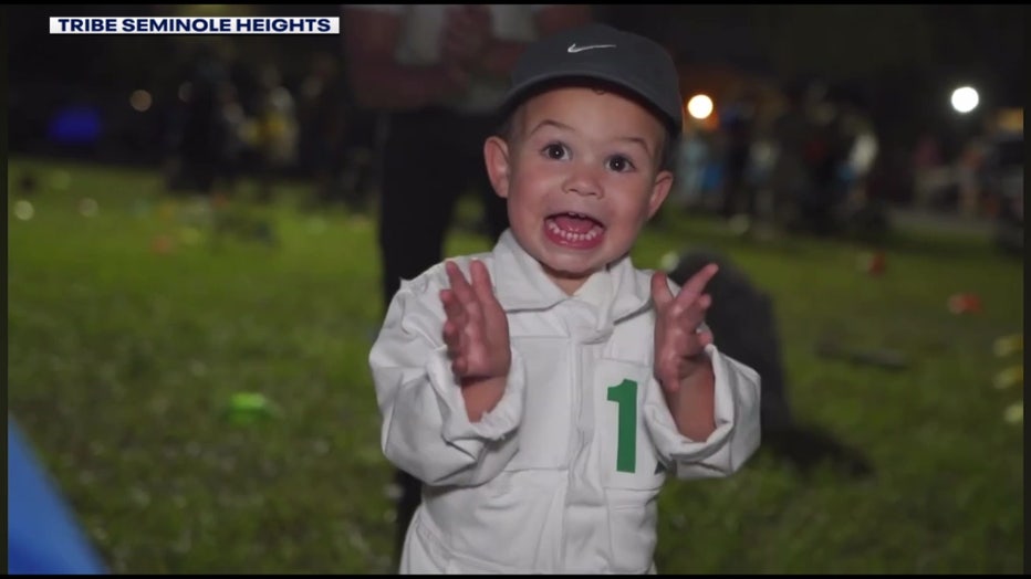 Child during Spooky Stroll courtesy of TRIBE Seminole Heights.