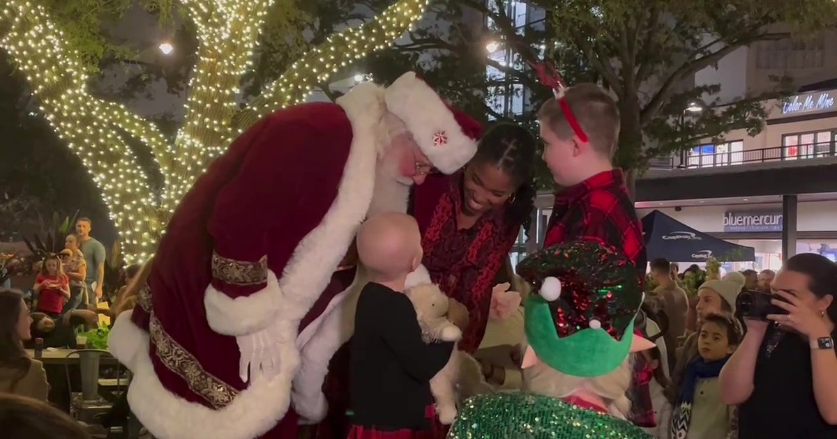 Pediatric cancer patient helps light Hyde Park Christmas tree during ...