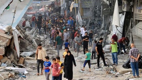 Israel-Hamas war closes in on Gaza City as thousands flee