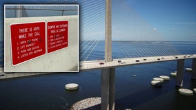 Crisis Center of Tampa Bay helps install signs on Sunshine Skyway: 'Reach out for help'
