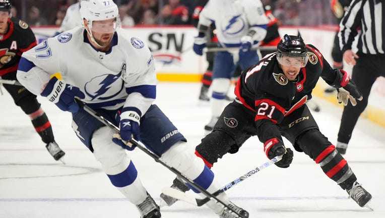 OTTAWA, CANADA - NOVEMBER 4: Mathieu Joseph #21 of the Ottawa Senators forechecks against Victor Hedman #77 the Tampa Bay Lightning at Canadian Tire Centre on November 4, 2023 in Ottawa, Ontario, Canada. (Photo by André Ringuette/NHLI via Getty Images)