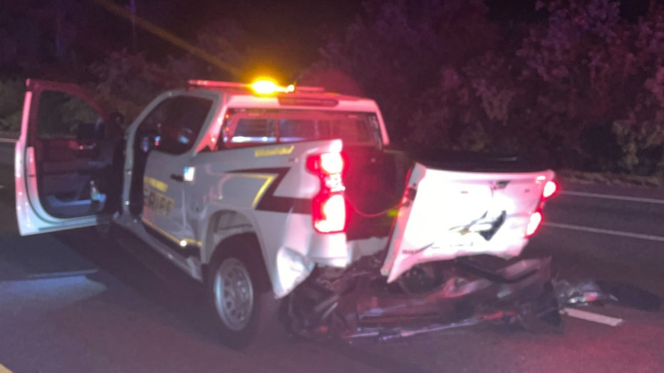 A deputy's vehicle was damaged after a suspected DUI driver crashed into the back of it. Image is courtesy of the Hillsborough County Sheriff's Office. 