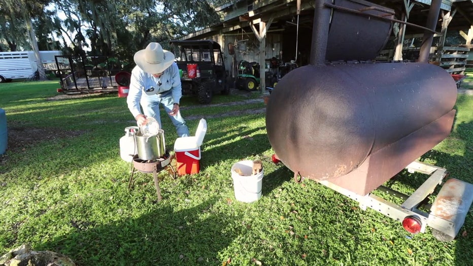 Calvin 'Buddy' Mills cooks swamp cabbage. 