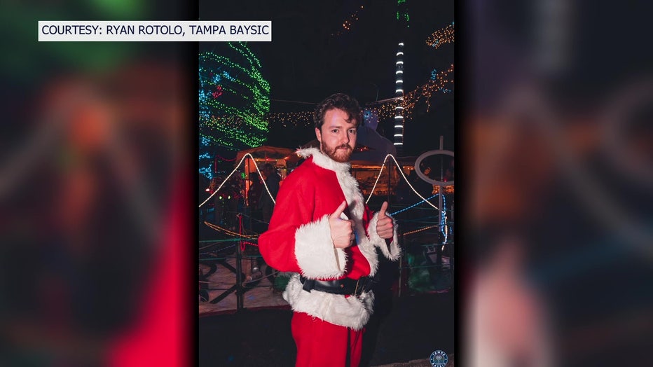 Man dressed like Santa for a Tampa Baysic party.