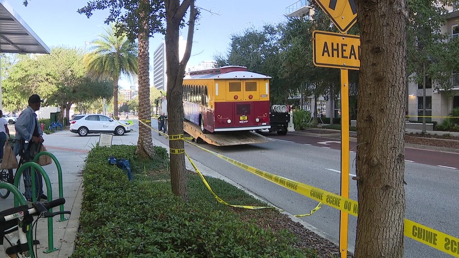 Crime scene tape near a trolley that hit a girl on Sunday.