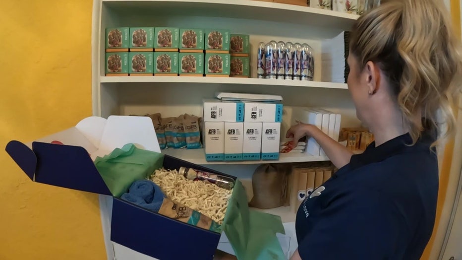 Vanessa Bernard packs Leaping Love boxes for cancer patients. 