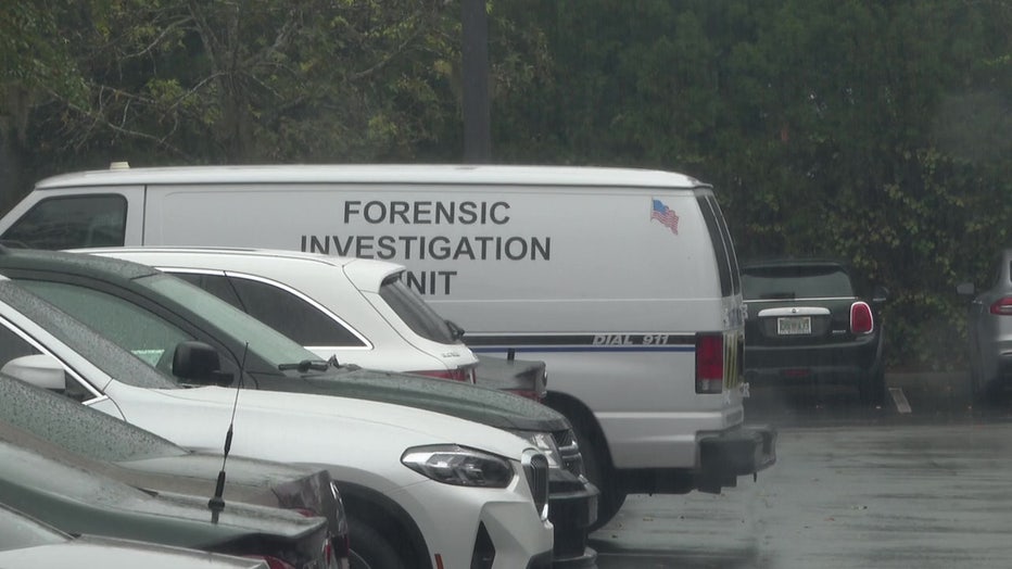 Forensic van at double homicide scene.