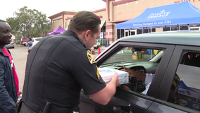 St. Pete Police Department gives away Domino's pizzas for holiday season