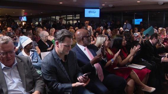 24 children officially adopted at 'Home Run for the Holidays' event at the Trop