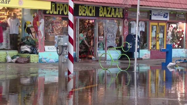 Gulfport residents clean up after storm causes flooding, power outages