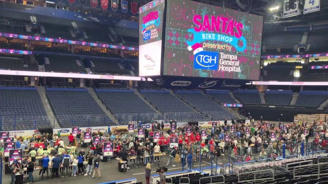 More than 1,000 bikes built for Bay Area children at 'Santa's Bike Shop' inside Amalie Arena