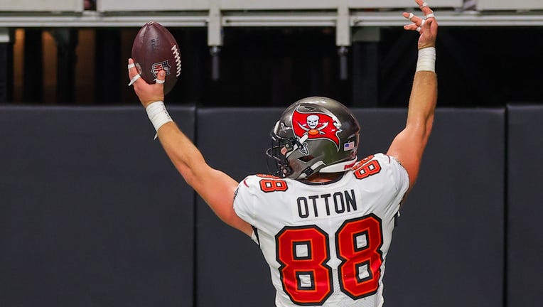 ATLANTA, GEORGIA - DECEMBER 10: Cade Otton #88 of the Tampa Bay Buccaneers reacts after a touchdown during the second half of the game against the Atlanta Falcons at Mercedes-Benz Stadium on December 10, 2023 in Atlanta, Georgia. (Photo by Kevin C. Cox/Getty Images)
