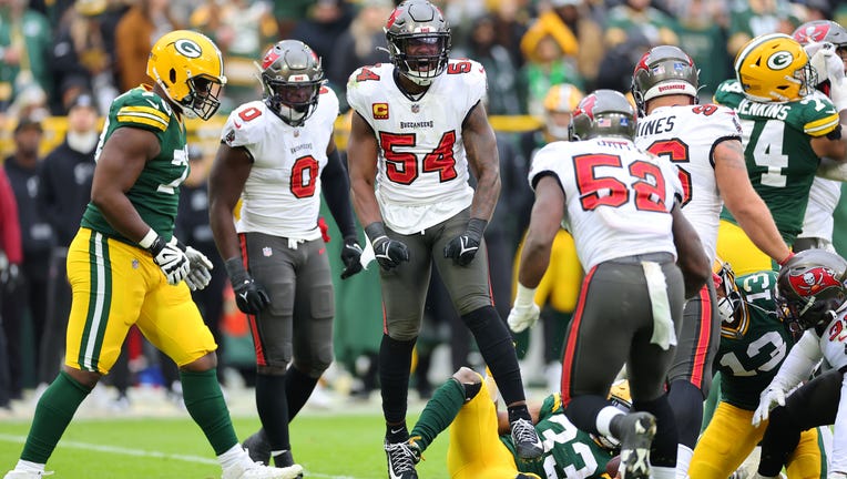 GREEN BAY, WISCONSIN - DECEMBER 17: Lavonte David #54 of the Tampa Bay Buccaneers reacts after a play during the third quarter against the Green Bay Packers at Lambeau Field on December 17, 2023 in Green Bay, Wisconsin. (Photo by Stacy Revere/Getty Images)