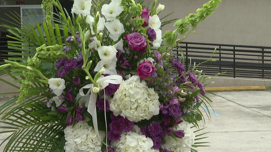 A vigil for the murdered mother and daughter was held on Sunday.