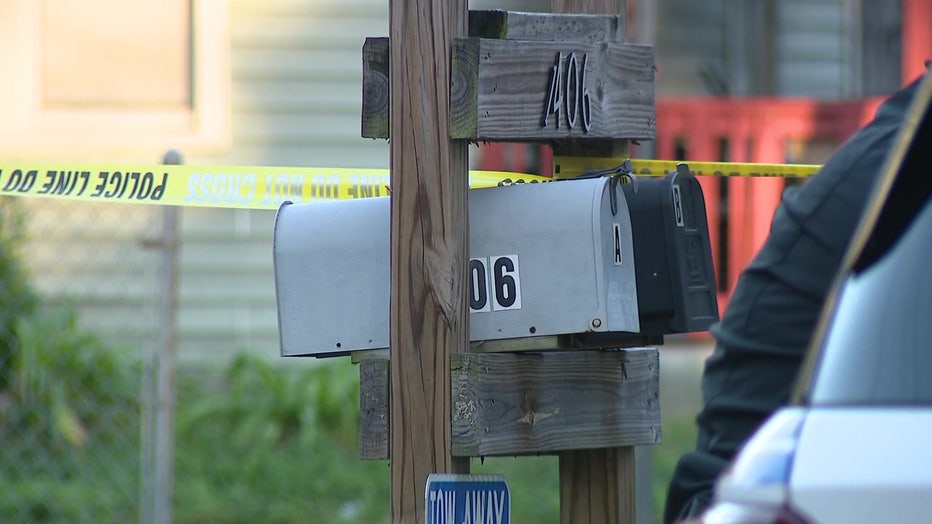 Crime scene tape next to a mailbox in Sulphur Springs at the scene of a fatal crash.
