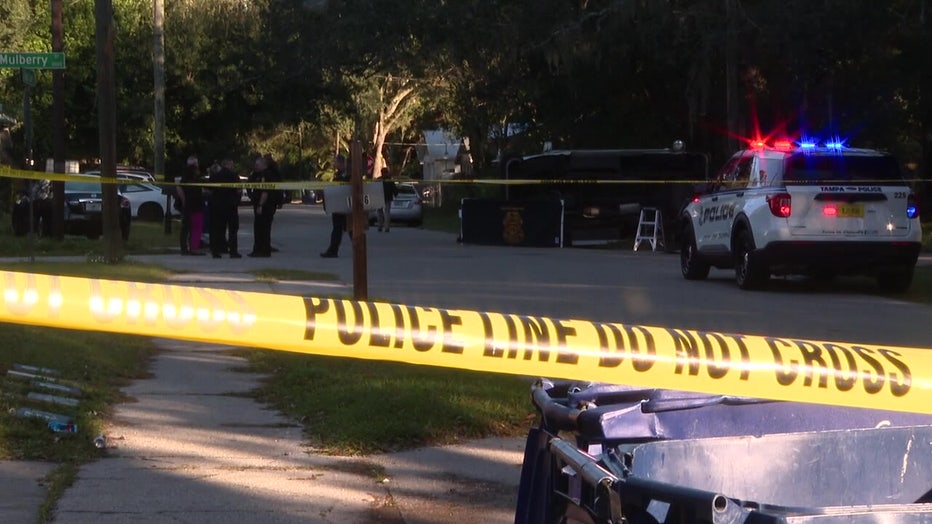 Crime scene tape at scene of hit-and-run crash that killed a Tampa mailman. 