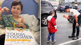 Hillsborough County boy receives challenge coin from HCSO deputies after battle with cancer