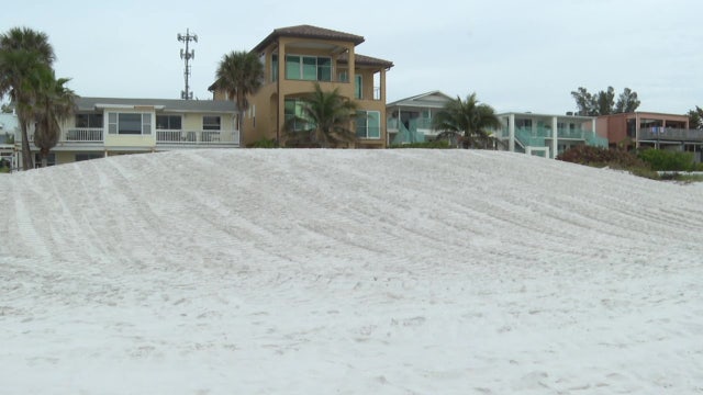 Indian Shores hotel's beachfront view blocked by big pile of sand from county renourishment project