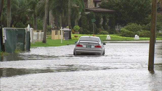 Shore Acres residents fed up with flooding take matters into their own hands: ‘We need solutions’