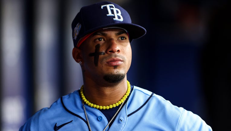 ST PETERSBURG, FLORIDA - APRIL 08: Wander Franco #5 of the Tampa Bay Rays looks on from the dugout during the third inning against the Oakland Athletics at Tropicana Field on April 08, 2023 in St Petersburg, Florida. (Photo by Kevin Sabitus/Getty Images)