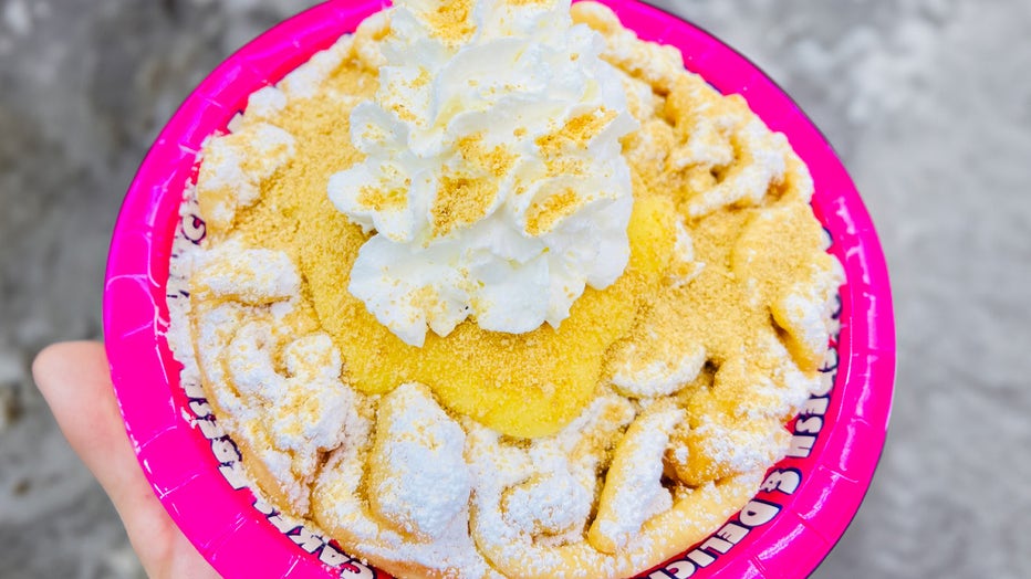 Fresh hot funnel cake topped with banana pudding, whipped cream and graham cracker crust.. Courtesy: Florida State Fair. 