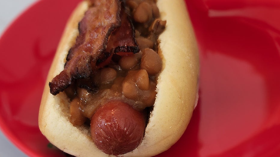 An all-beef hotdog topped with baked beans and applewood bacon. Courtesy: Florida State Fair. 