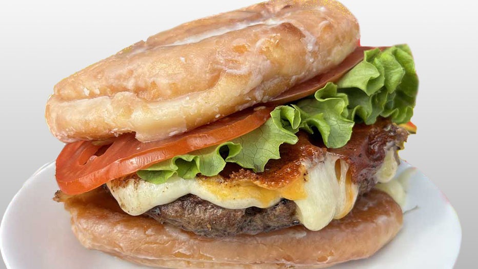 Flame-grilled burger topped with melted cheese curds nestled between two Honey Buns. Courtesy: Florida State Fair. 