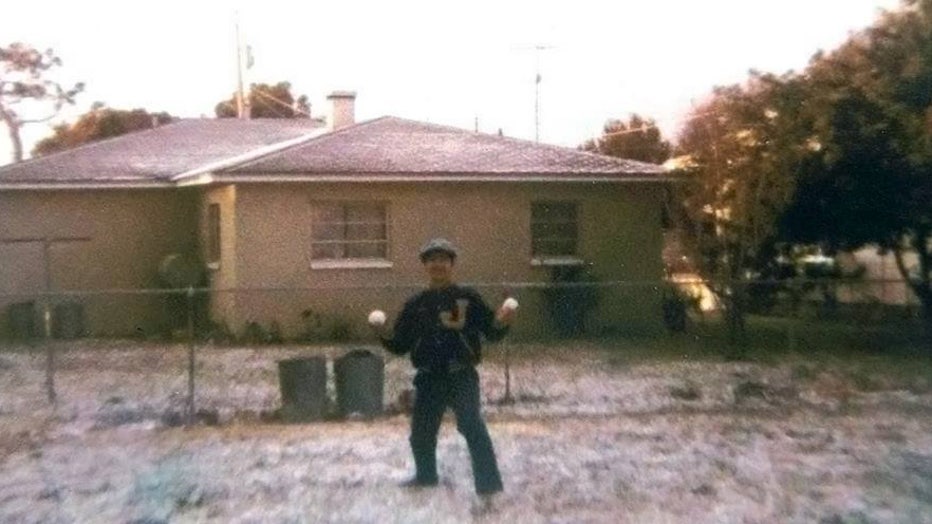 Mario Nunez holds two snowballs as snow blankets the ground in Tampa on Jan. 19, 1977. Image is courtesy of Mario Nunez. 