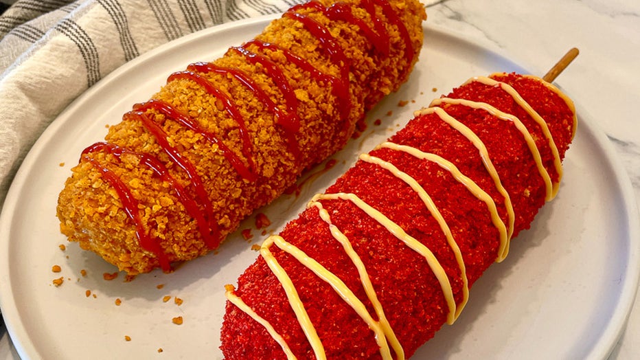 A decadent hot dog dipped in buttermilk batter, layered with cheese and coated in crushed Flaming Hot Cheetos. Courtesy: Florida State Fair. 