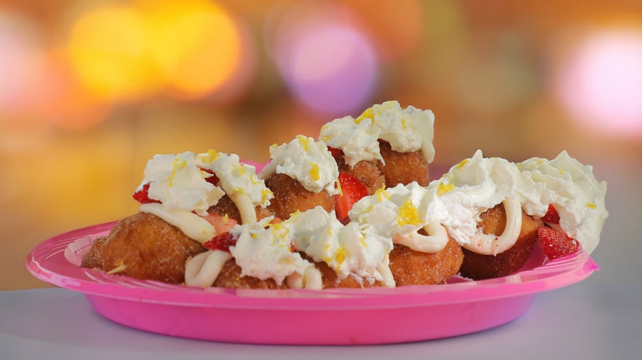 Mini donuts & fresh strawberry kebabs topped with icing, fresh lemon zest, whip cream, & lemon infused honey. Courtesy of the Florida State Fair. 