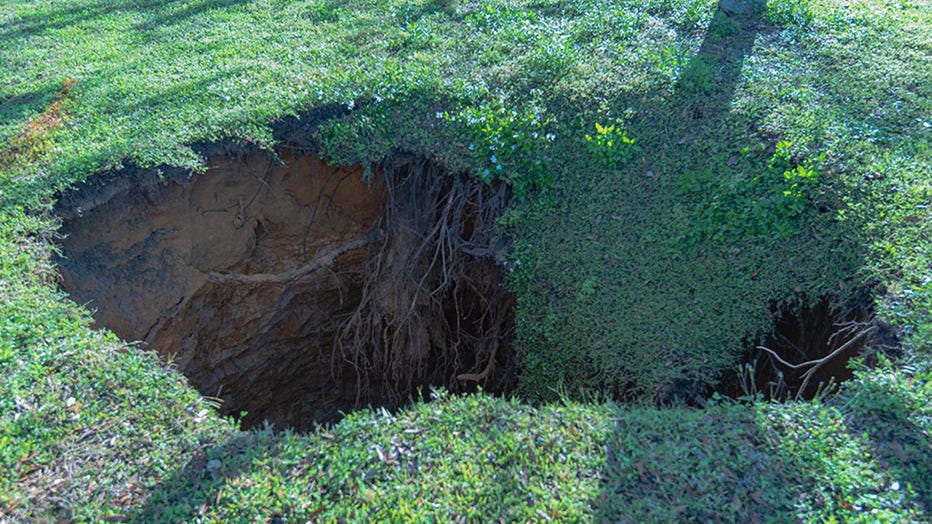 60-foot-deep Sinkhole Opens In Front Of Highland City Home: PCFR | FOX ...