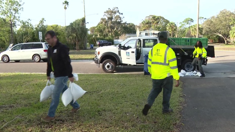 Crews deliver sandbags to St. Pete neighborhood ahead of more rain. 