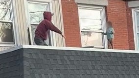 Watch: Man saves toddler walking on roof in Rhode Island