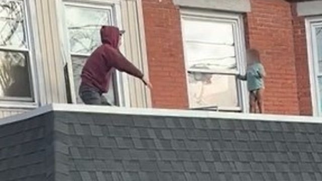 Watch: Man saves toddler walking on roof in Rhode Island